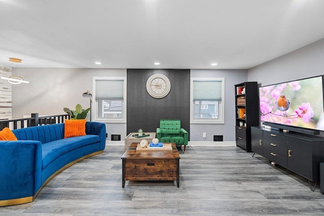 181 Central Park Rd E, Plainview, NY 11803 - living room with wood finished floors, recessed lighting, and baseboards