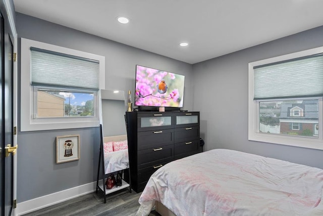181 Central Park Rd E, Plainview, NY 11803 - bedroom featuring dark wood-type flooring, multiple windows, baseboards, and recessed lighting