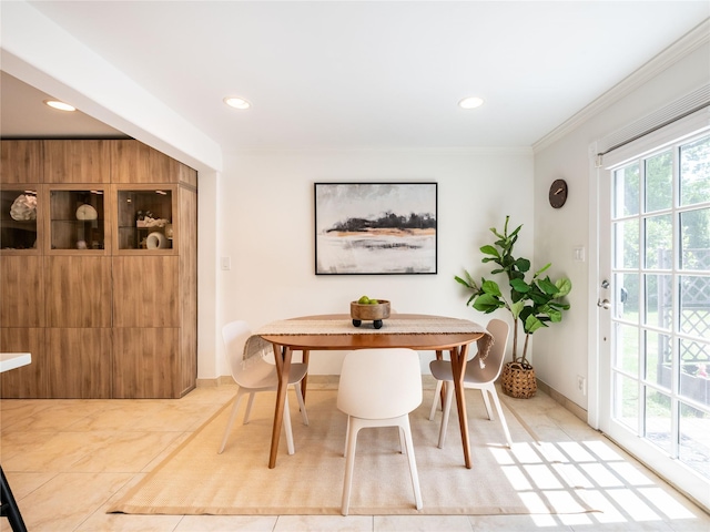 94 Shadyside Ave, Port Washington, NY 11050 - dining space featuring ornamental molding, recessed lighting, and baseboards