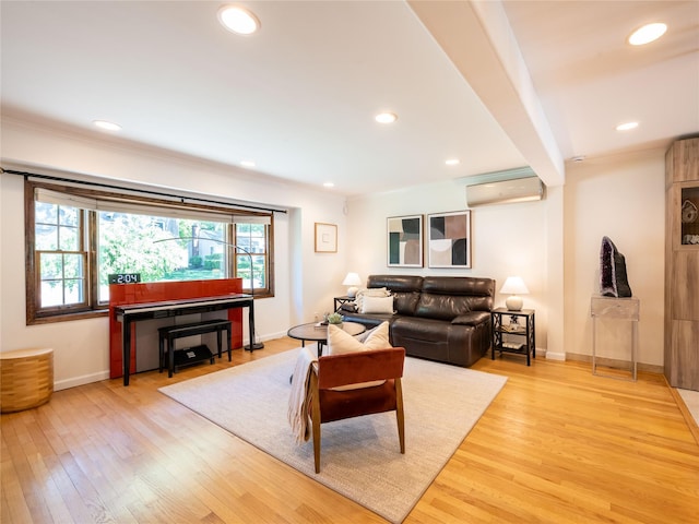 94 Shadyside Ave, Port Washington, NY 11050 - living room featuring a wall mounted AC, light wood finished floors, baseboards, ornamental molding, and recessed lighting