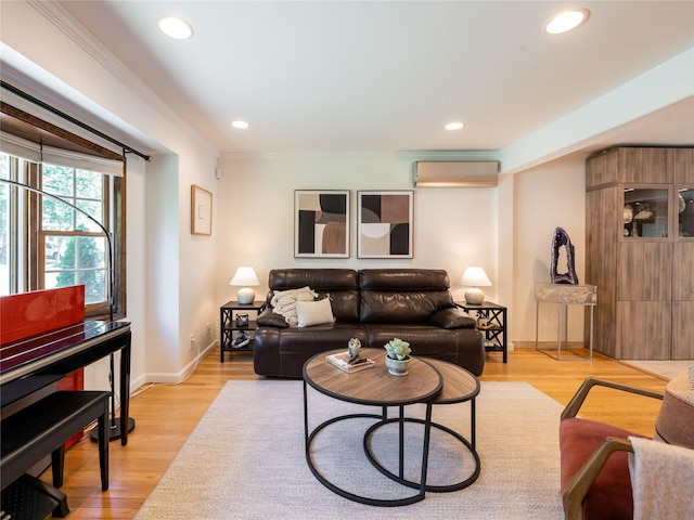 94 Shadyside Ave, Port Washington, NY 11050 - living room with a wall unit AC, recessed lighting, ornamental molding, light wood-type flooring, and baseboards