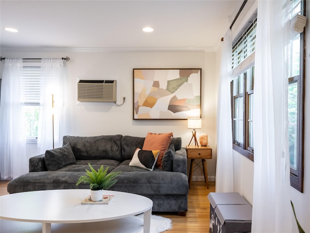 94 Shadyside Ave, Port Washington, NY 11050 - living area featuring light wood-style flooring, ornamental molding, plenty of natural light, a wall mounted air conditioner, and recessed lighting