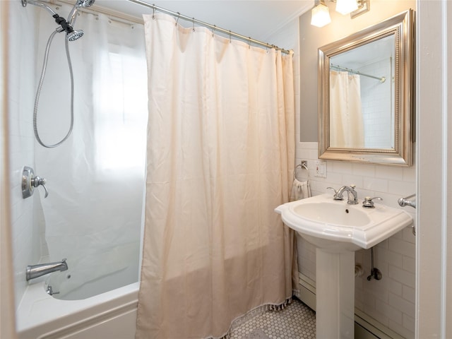 94 Shadyside Ave, Port Washington, NY 11050 - bathroom featuring shower / tub combo, tile patterned flooring, ornamental molding, tile walls, and a sink