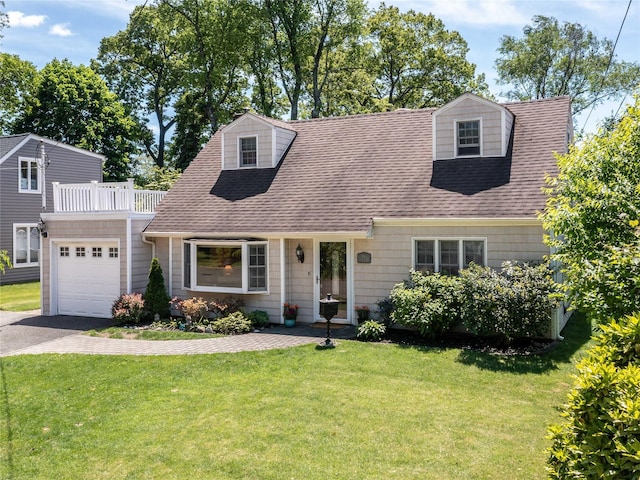 94 Shadyside Ave, Port Washington, NY 11050 - view of front of house featuring roof with shingles, an attached garage, a front lawn, and asphalt driveway