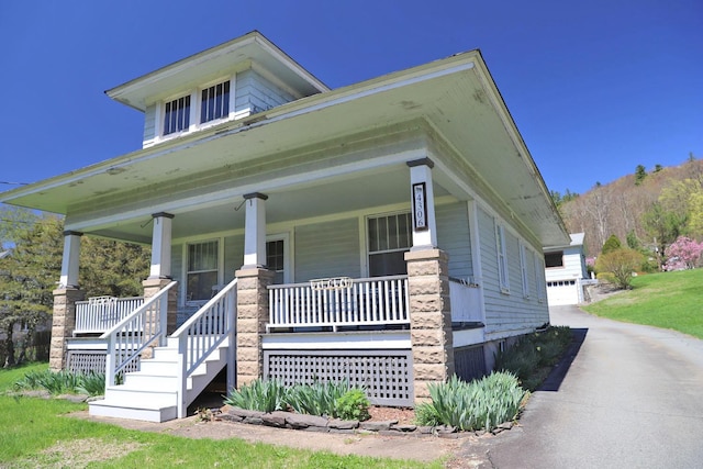 4304 State Route 17b, Callicoon, NY 12723 - view of front of home with covered porch and a garage