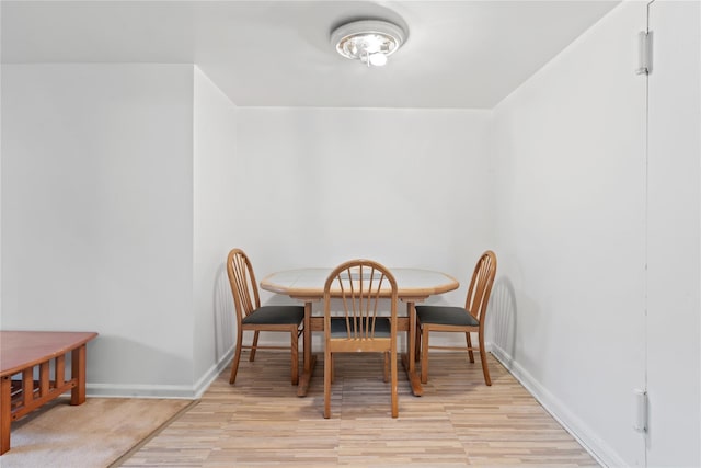 110-20 71st Ave Unit 106, Forest Hills, NY 11375 - dining space featuring wood finished floors and baseboards