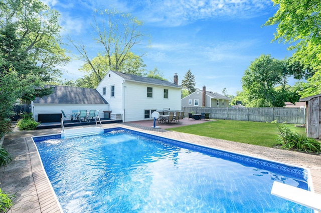 105 1st Ave, Kings Park, NY 11754 - view of swimming pool with outdoor dining space, a patio area, a wooden deck, and a diving board