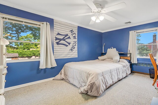 105 1st Ave, Kings Park, NY 11754 - carpeted bedroom with ornamental molding and ceiling fan
