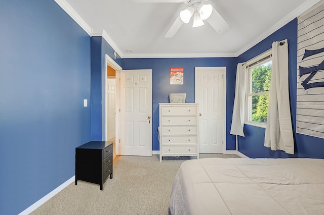 105 1st Ave, Kings Park, NY 11754 - bedroom featuring carpet, ornamental molding, a closet, and ceiling fan