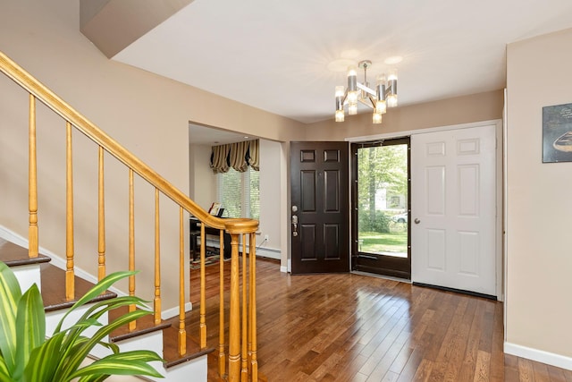10 Northwood Ct, Dix Hills, NY 11746 - foyer with stairway, hardwood / wood-style floors, a chandelier, and baseboards