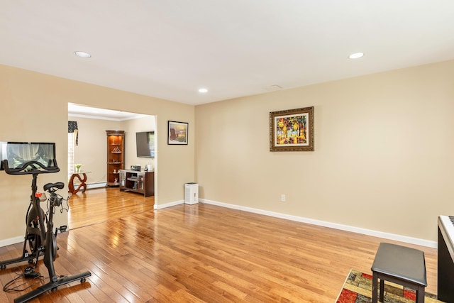 10 Northwood Ct, Dix Hills, NY 11746 - workout area featuring light wood-style floors, recessed lighting, and baseboards