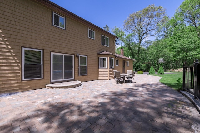 10 Northwood Ct, Dix Hills, NY 11746 - back of property featuring a patio and outdoor dining space