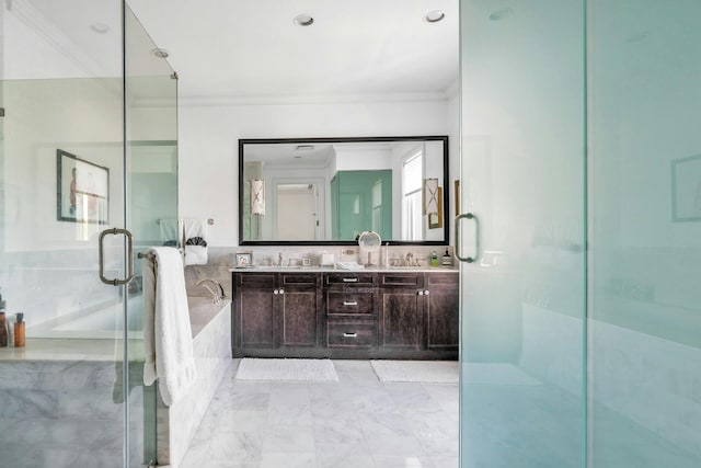 bathroom featuring ornamental molding, double vanity, a shower stall, and marble finish floors