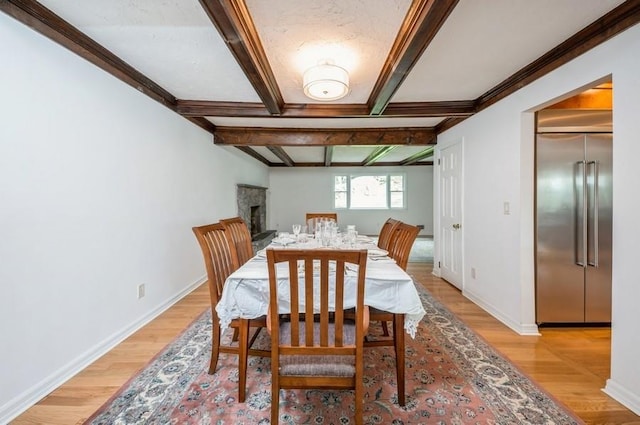 12 Glenn Pl, Hastings-On-Hudson, NY 10706 - dining room with light wood-type flooring, baseboards, beam ceiling, and coffered ceiling