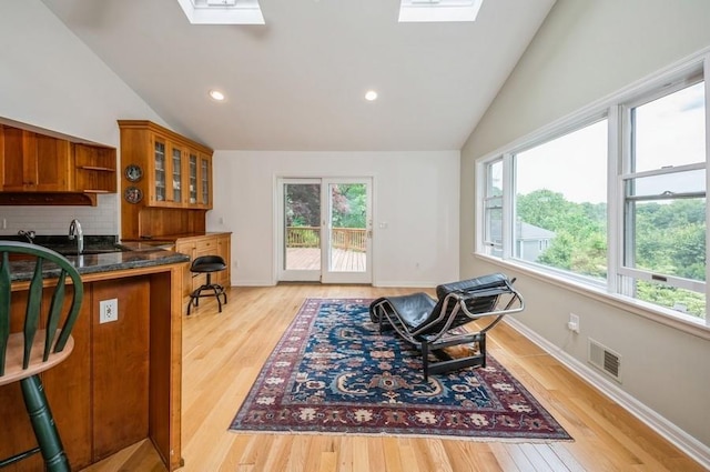 12 Glenn Pl, Hastings-On-Hudson, NY 10706 - office with a skylight, lofted ceiling, light wood-style floors, baseboards, and recessed lighting