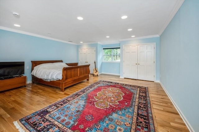 12 Glenn Pl, Hastings-On-Hudson, NY 10706 - bedroom featuring multiple closets, crown molding, wood finished floors, baseboards, and recessed lighting