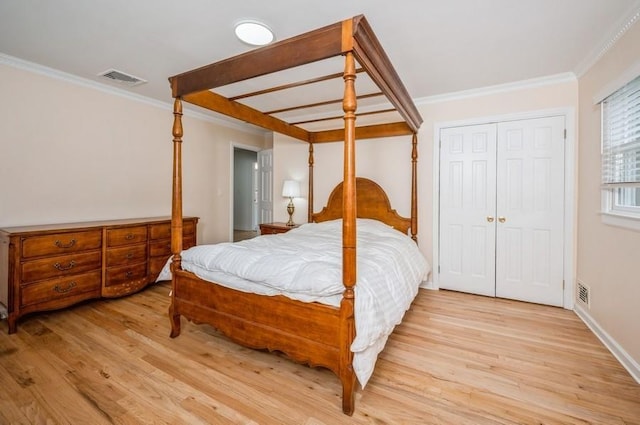 12 Glenn Pl, Hastings-On-Hudson, NY 10706 - bedroom featuring light wood-style floors, ornamental molding, and a closet