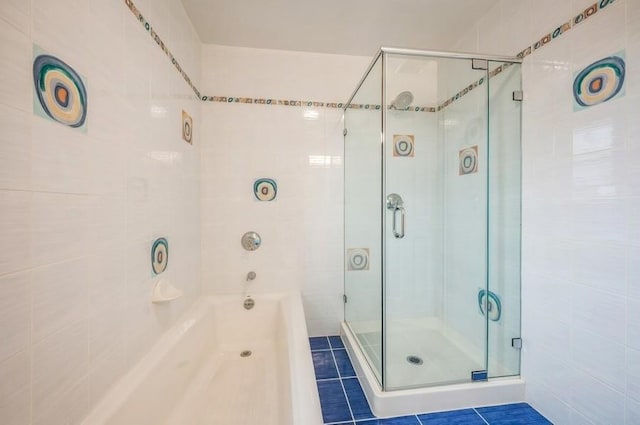12 Glenn Pl, Hastings-On-Hudson, NY 10706 - bathroom with a shower stall, a garden tub, and tile patterned flooring