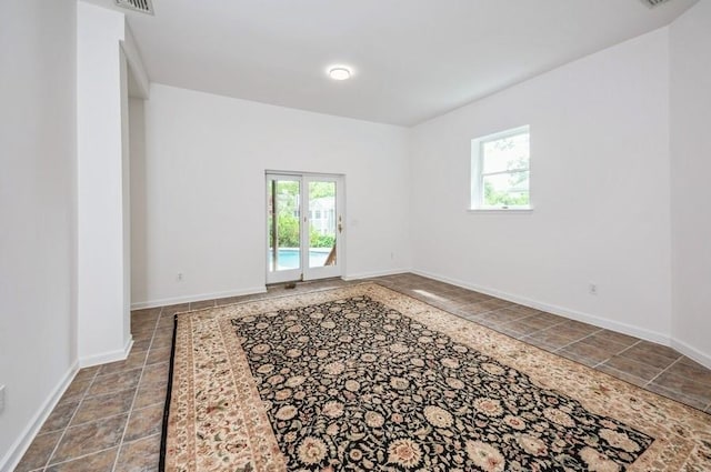 12 Glenn Pl, Hastings-On-Hudson, NY 10706 - empty room with baseboards and stone finish floors