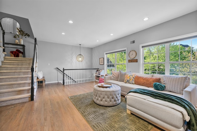 40 Peter Turner Rd, Monroe, NY 10950 - living area featuring healthy amount of natural light, recessed lighting, wood finished floors, baseboards, and arched walkways