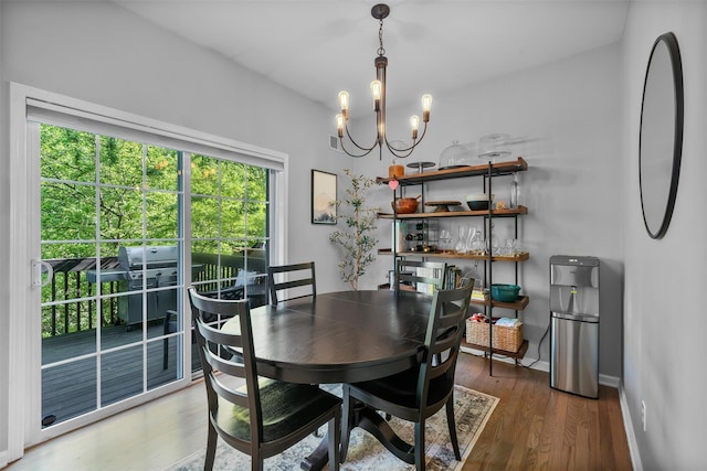 40 Peter Turner Rd, Monroe, NY 10950 - dining room with a chandelier, wood finished floors, and baseboards