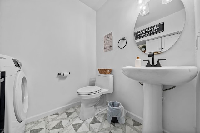 40 Peter Turner Rd, Monroe, NY 10950 - half bathroom with washer / dryer, baseboards, and toilet