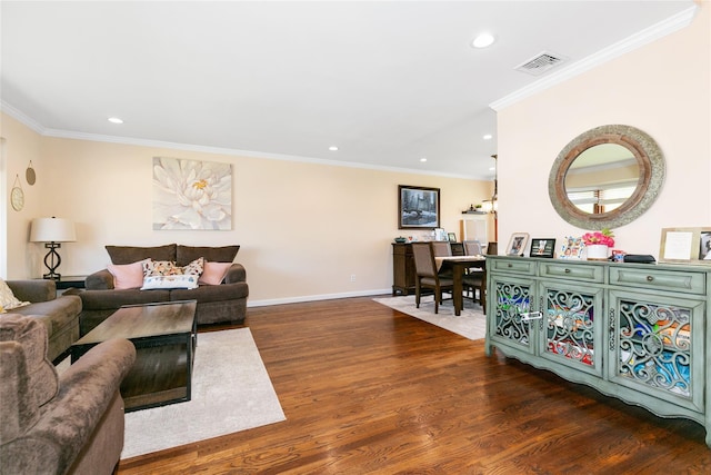 living area featuring dark wood-style flooring, recessed lighting, crown molding, and baseboards