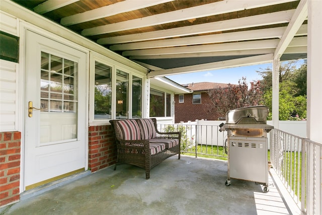 view of patio featuring fence
