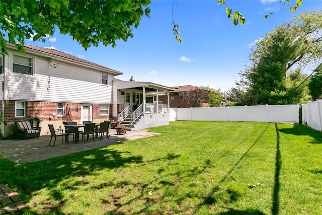 view of yard with a patio area