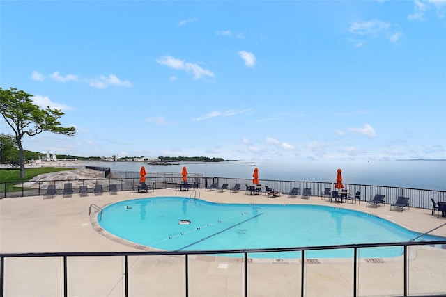 16 Waters Edge Unit 16, Rye, NY 10580 - community pool featuring a water view and a patio