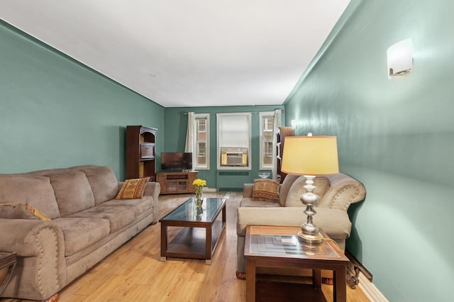 117-01 Park Ln S Unit C 1F, Kew Gardens, NY 11418 - living area with wood finished floors and cooling unit