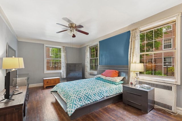 117-01 Park Ln S Unit C 1F, Kew Gardens, NY 11418 - bedroom featuring radiator, baseboards, wood finished floors, and ceiling fan