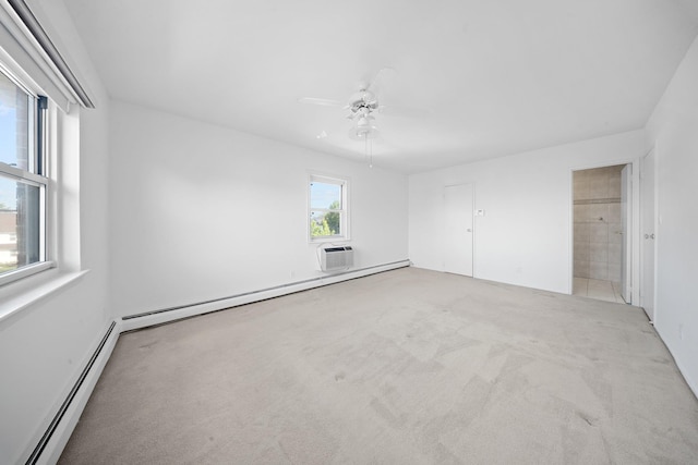 unfurnished bedroom with a baseboard heating unit, baseboard heating, carpet floors, ceiling fan, and a wall mounted AC