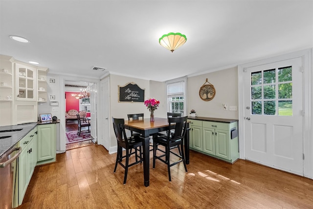 70 Willow Ln, New Windsor, NY 12553 - dining space with wood finished floors, a chandelier, crown molding, baseboards, and recessed lighting