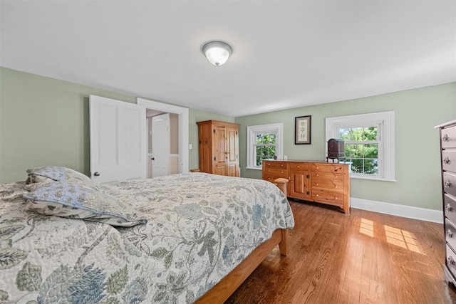 70 Willow Ln, New Windsor, NY 12553 - bedroom with wood finished floors and baseboards
