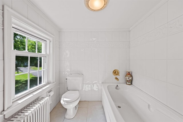 70 Willow Ln, New Windsor, NY 12553 - full bathroom with radiator heating unit, tile patterned flooring, a garden tub, toilet, and tile walls