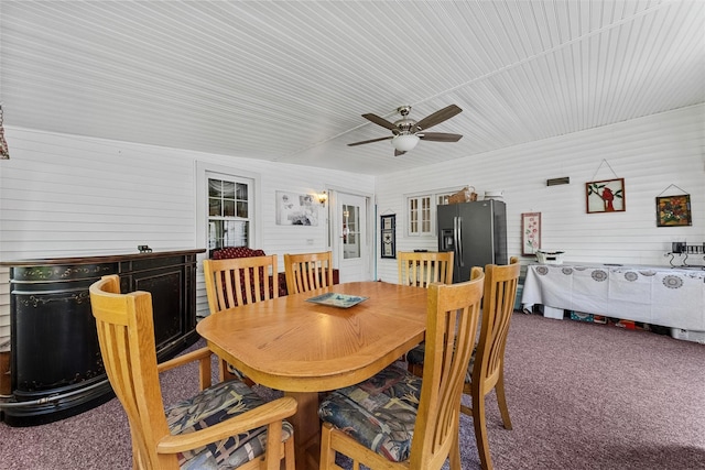 70 Willow Ln, New Windsor, NY 12553 - carpeted dining area featuring ceiling fan and wooden walls