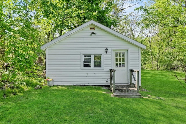 70 Willow Ln, New Windsor, NY 12553 - back of property with a lawn and an outbuilding