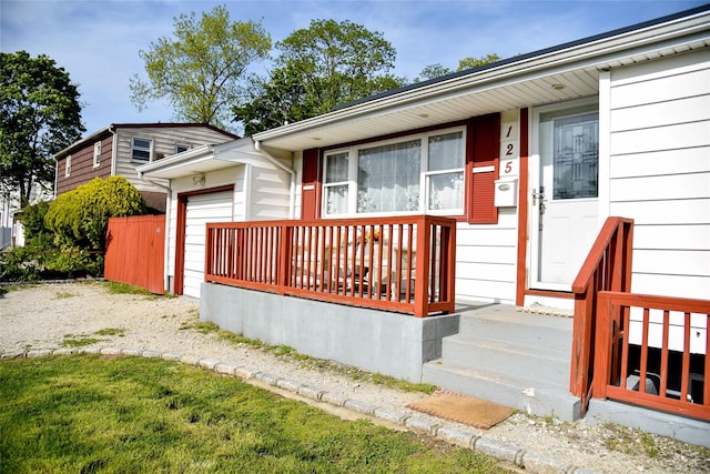 125 Timberline Dr, Brentwood, NY 11717 - view of front of home with an attached garage