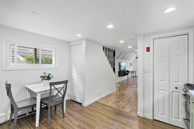 42 Campwoods Rd, Ossining, NY 10562 - dining room featuring stairway, wood finished floors, recessed lighting, and baseboards