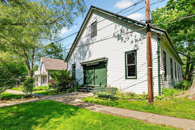 42 Campwoods Rd, Ossining, NY 10562 - view of front of home with a front yard and entry steps