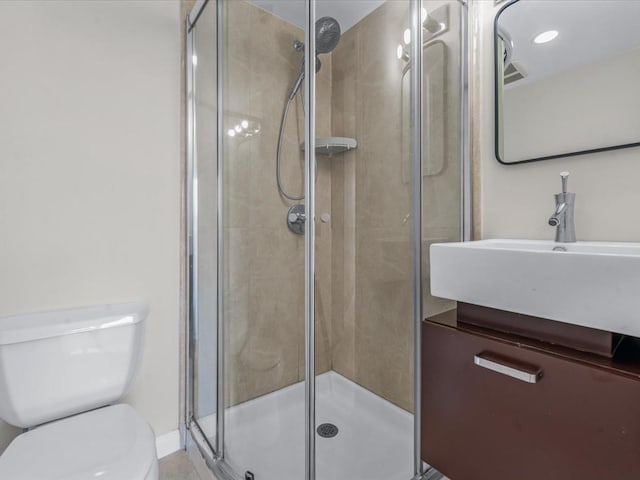 88-20 Parsons Blvd Unit 6D, Jamaica, NY 11432 - full bathroom with a shower stall, toilet, vanity, and baseboards