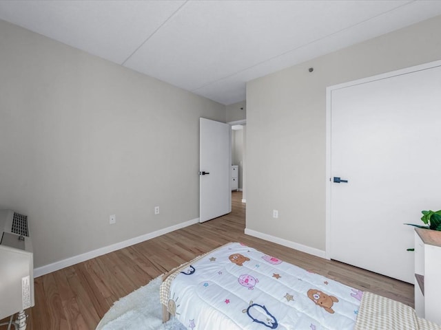 88-20 Parsons Blvd Unit 6D, Jamaica, NY 11432 - bedroom featuring wood finished floors and baseboards