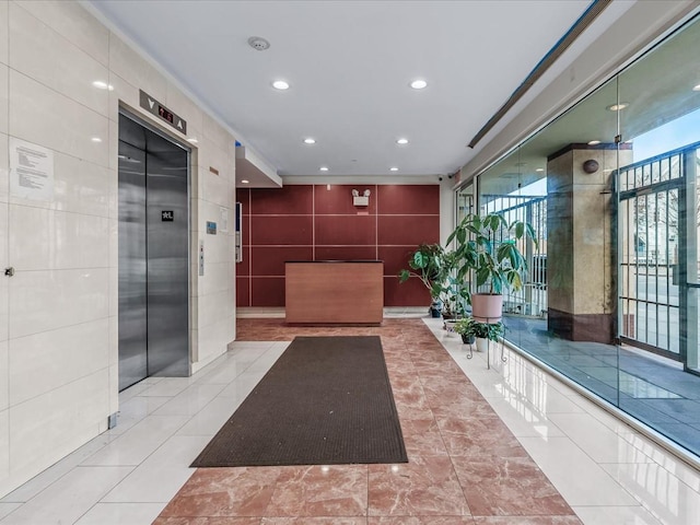 88-20 Parsons Blvd Unit 6D, Jamaica, NY 11432 - building lobby with tile walls and recessed lighting