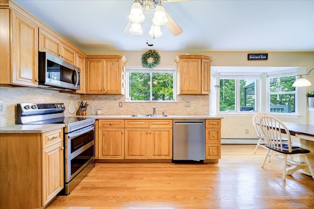 7 Cambridge Cir, Monroe, NY 10950 - kitchen featuring stainless steel appliances, plenty of natural light, light countertops, and a sink