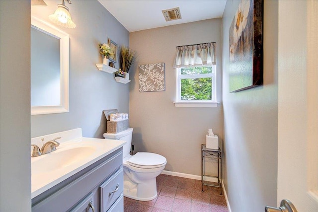 7 Cambridge Cir, Monroe, NY 10950 - bathroom with toilet, vanity, baseboards, and tile patterned flooring