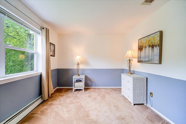 7 Cambridge Cir, Monroe, NY 10950 - living area with a baseboard radiator, carpet floors, and baseboards