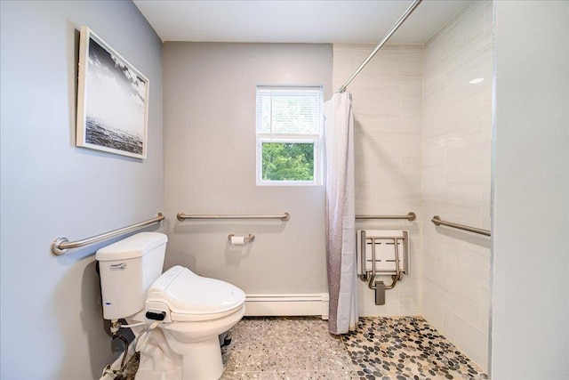 7 Cambridge Cir, Monroe, NY 10950 - bathroom with a baseboard radiator, a tile shower, and toilet