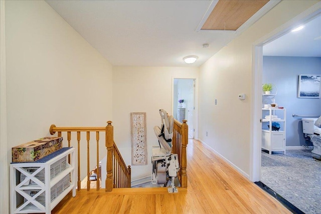 7 Cambridge Cir, Monroe, NY 10950 - corridor with an upstairs landing, wood finished floors, attic access, and baseboards