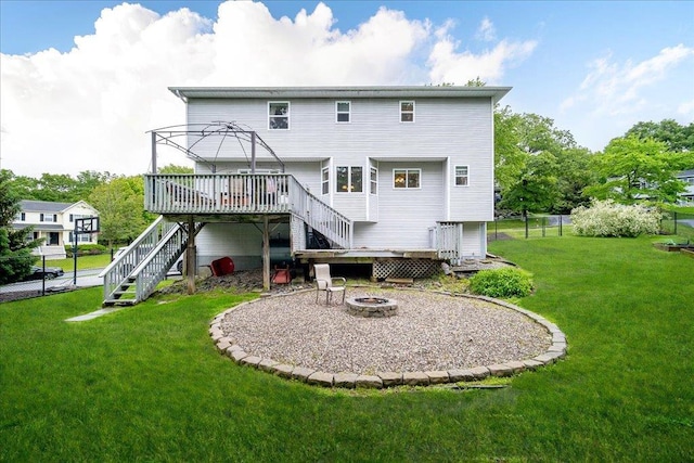 7 Cambridge Cir, Monroe, NY 10950 - rear view of house featuring stairs, a fire pit, and a deck